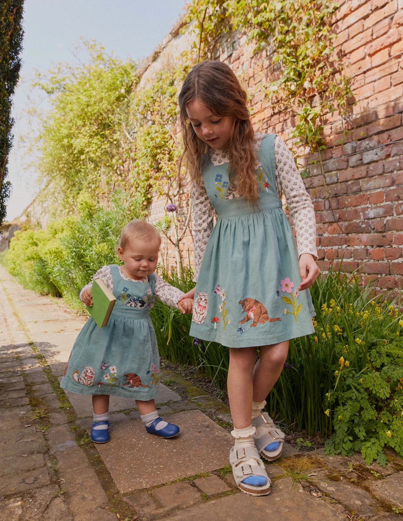 NWT Mini Boden Cord Applique Pinafore – Mini World Explorers